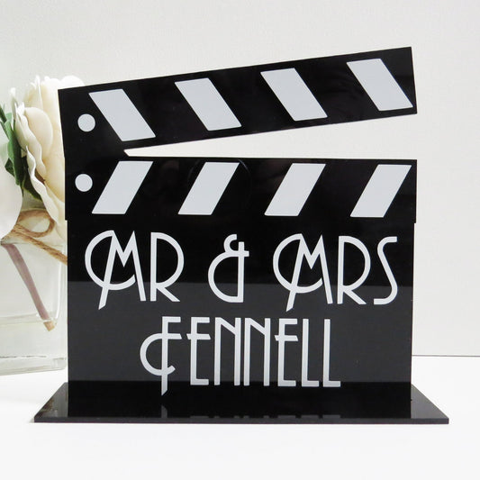 Customisable clapperboard shaped sign.
