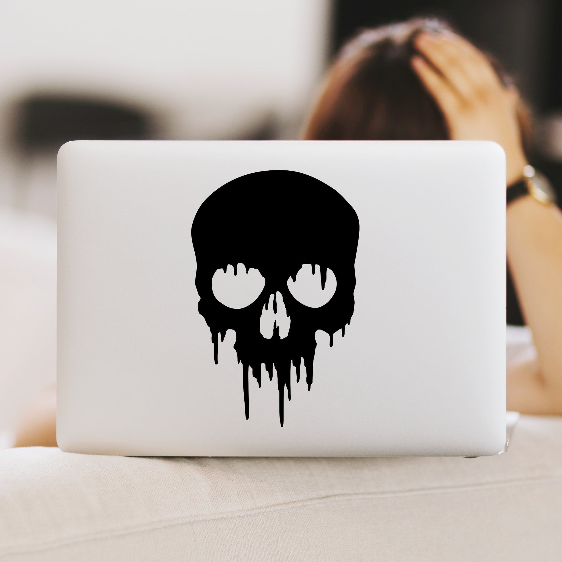 Dripping skull laptop vinyl decal sticker.