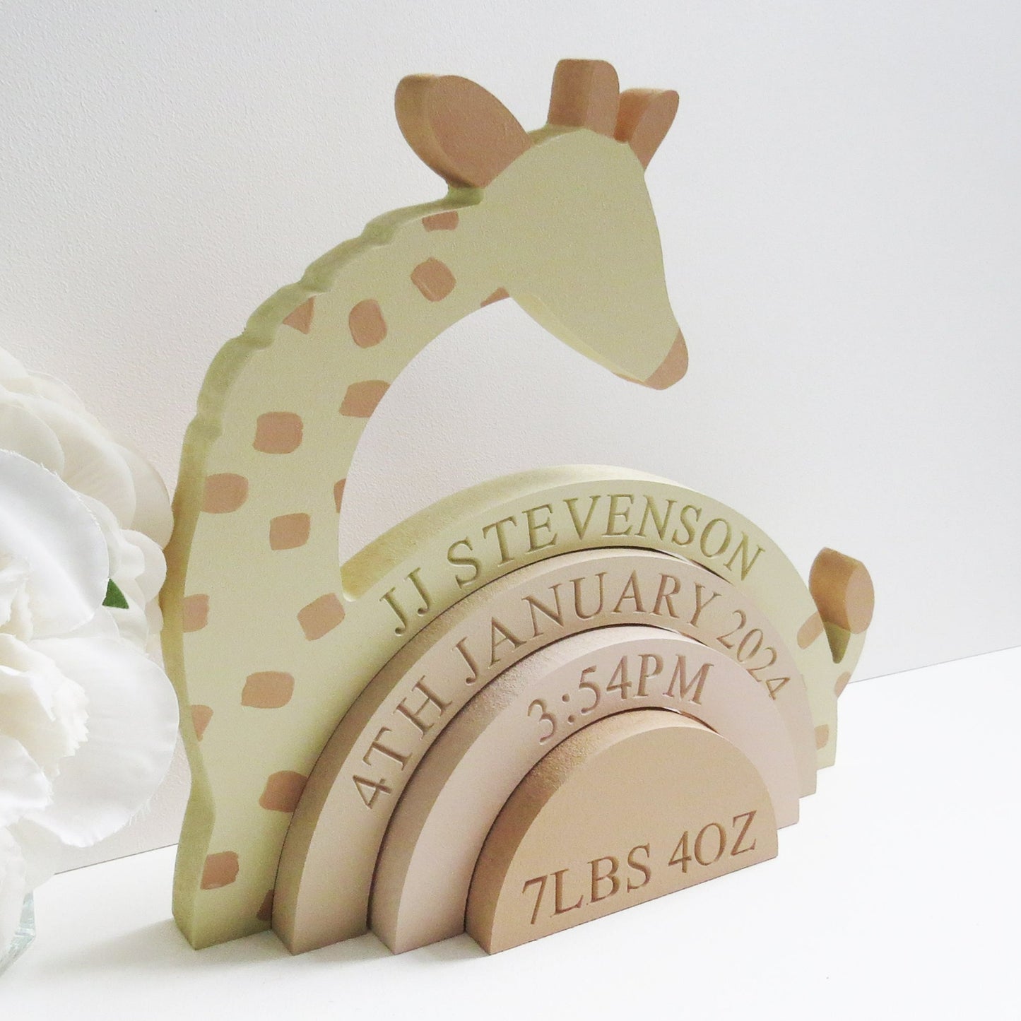 Giraffe themed rainbow stacker. Perfect for a kids nursery or bedroom.