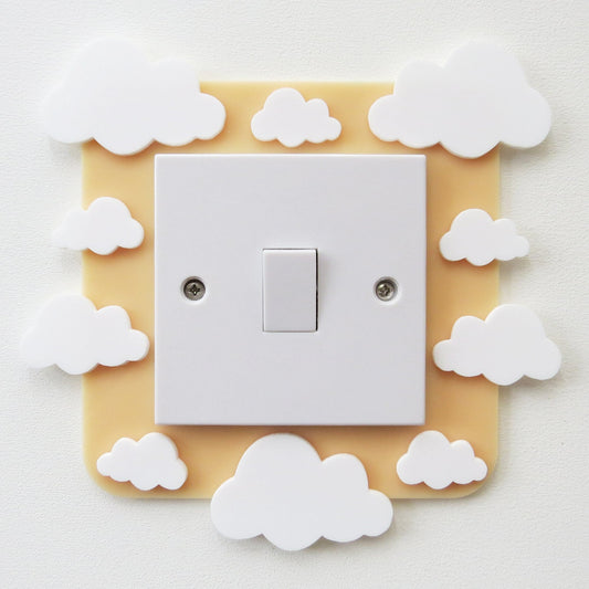 A kids bedroom acrylic light surround decoratedwith clouds.