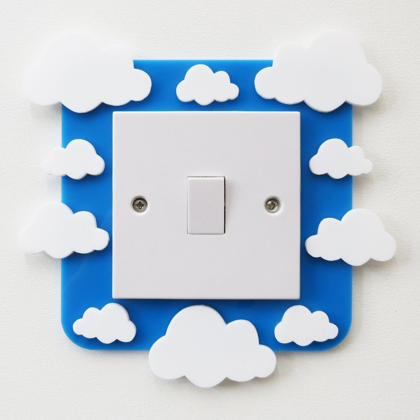 A kids bedroom acrylic light surround decoratedwith clouds.