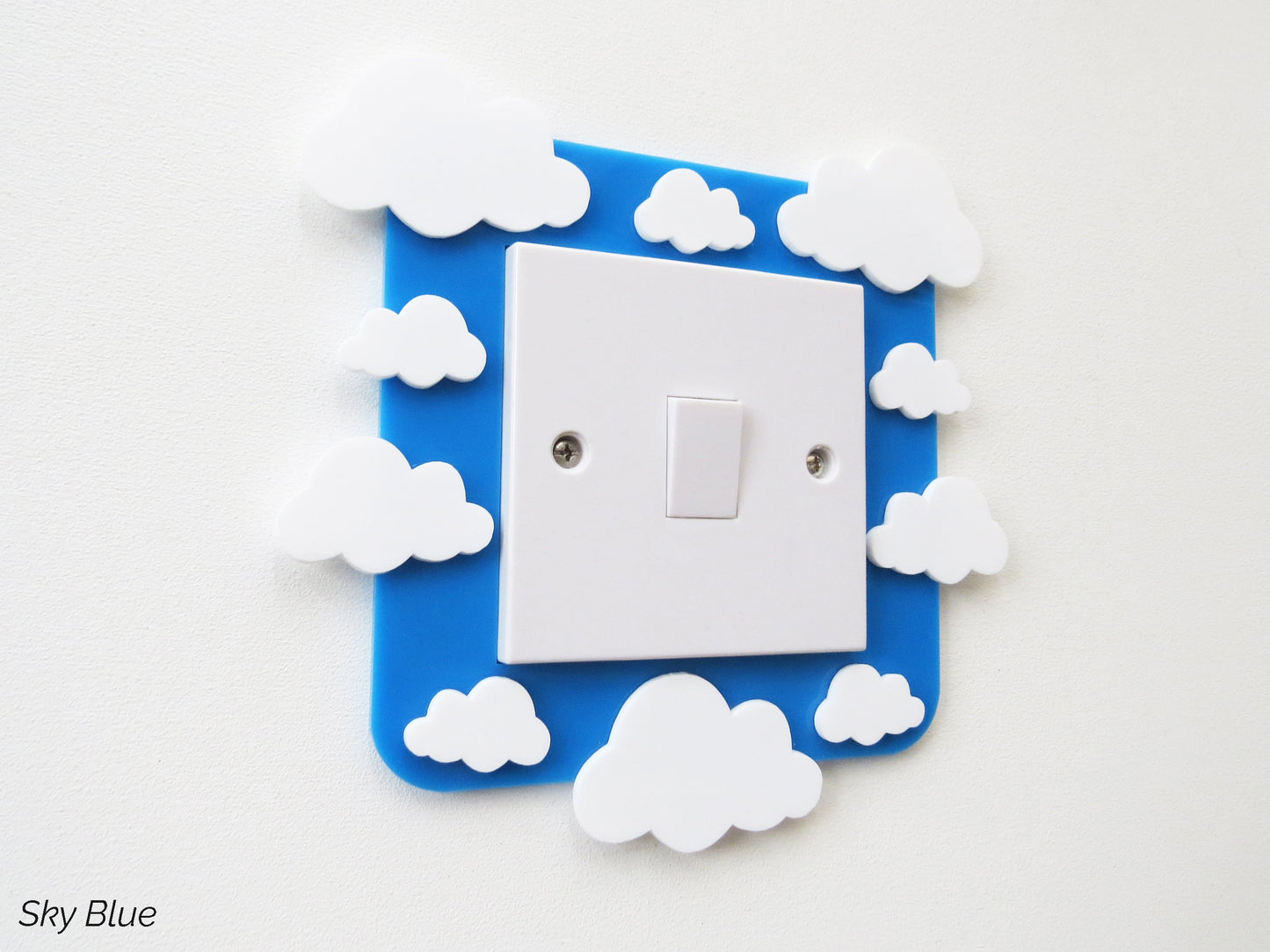 A kids bedroom acrylic light surround decoratedwith clouds.