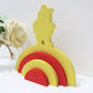 Winnie the pooh designed rainbow stacker painted red and yellow.