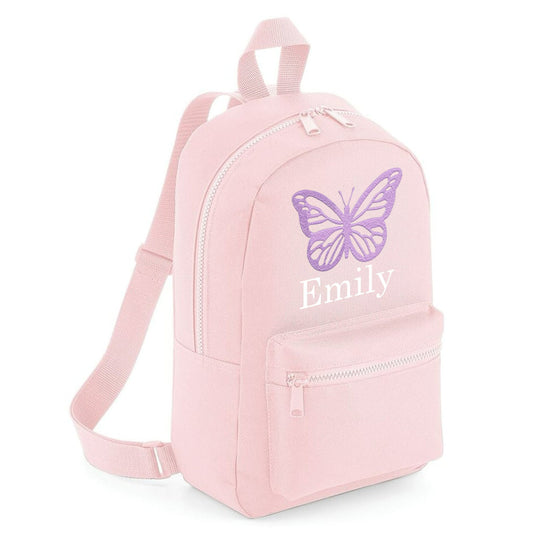 A butterfly embroidered personalsied custom name childrens backpack school bag. 
