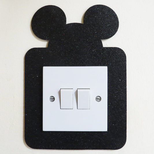 Disney Mickey Mouse shaped light switch surround.