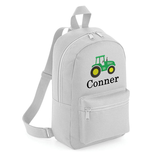 A tractor embroidered personalsied custom name childrens backpack school bag.