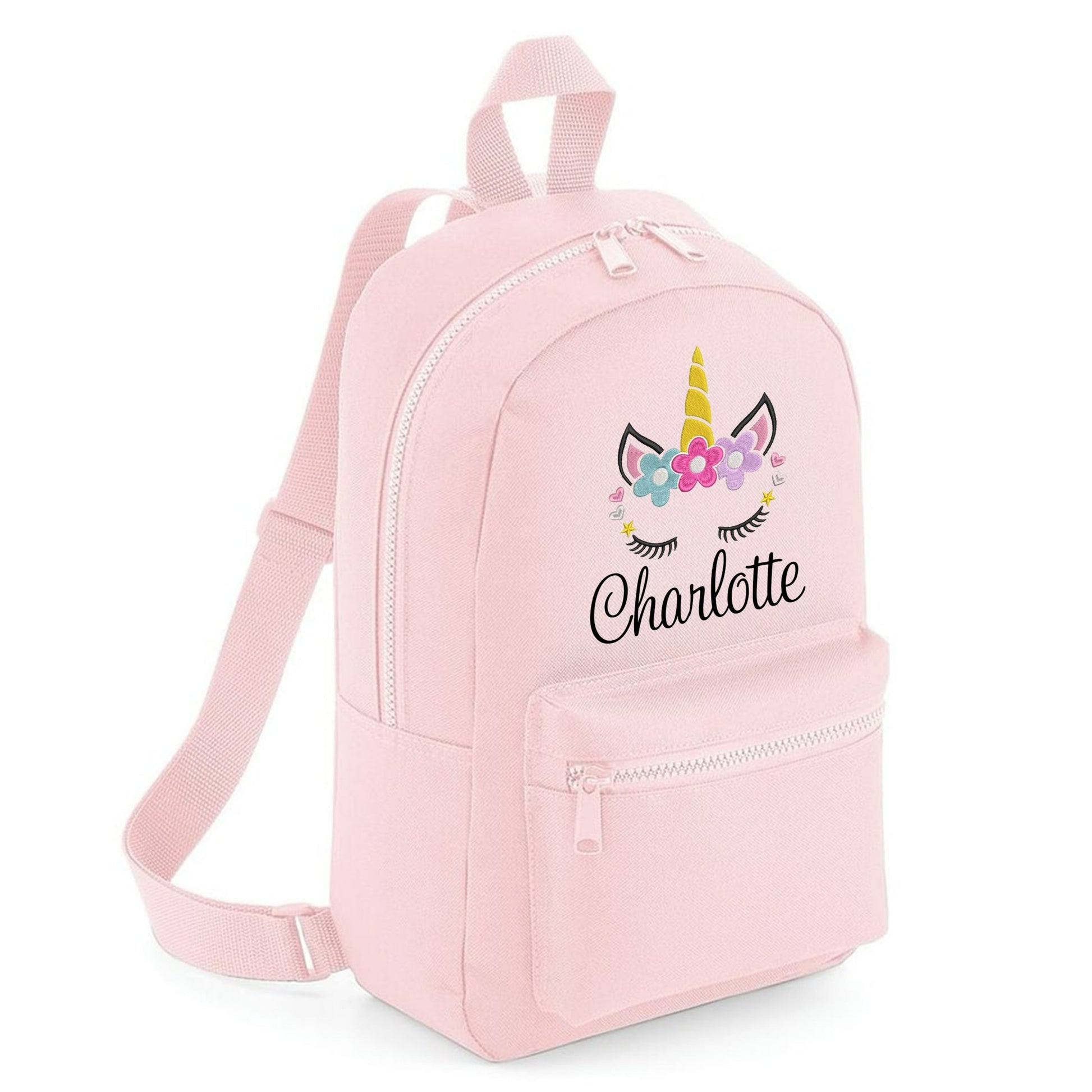 A unicorn embroidered personalsied custom name childrens backpack school bag
